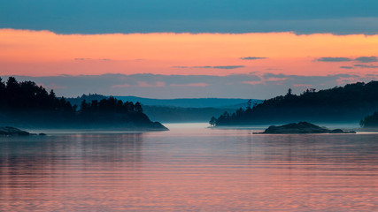Obraz premium Calm Misty Sunset over Lake Superior