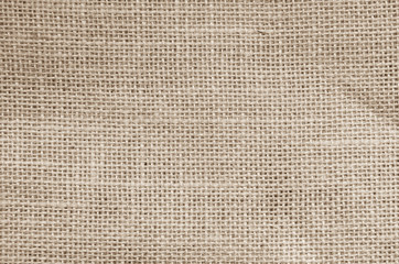 Vintage abstract Hessian or sackcloth fabric or hemp sack texture background. Wallpaper of artistic wale linen canvas. Blanket or Curtain of cotton pattern with copy space for text decoration.
