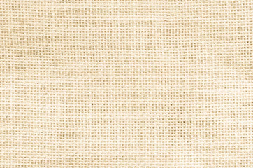 Fototapeta na wymiar Vintage abstract Hessian or sackcloth fabric or hemp sack texture background. Wallpaper of artistic wale linen canvas. Blanket or Curtain of cotton pattern with copy space for text decoration.
