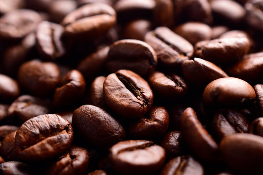macro image of roasted coffee beans , background