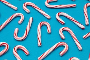 A Candy Cane Background on a Blue Background