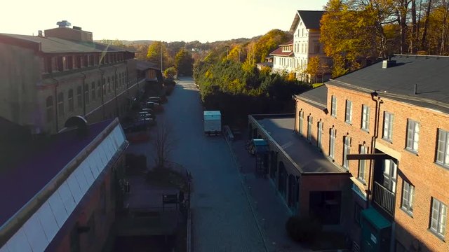 Road inside a factoryarea, smooth dronefootage