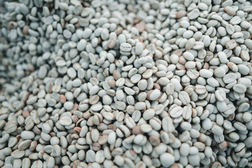 Parchment coffee Dried beans Coffee,  Coffee drying in the house