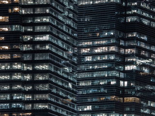 Fototapeta na wymiar Skyscraper Windows - Cool Night