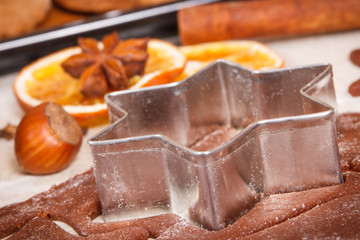 Dough, ingredients for baking gingerbread and fresh baked cookies for Christmas time