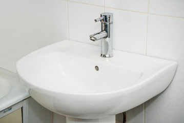 The photo of a sink in a bathroom