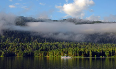 Sunny morning on the alpine lake.