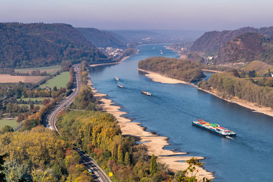 Drought in Germany, low water of the Rhine river in andernach near koblenz influending water transport freight ships