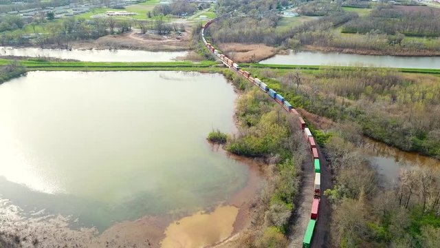 Skyview over top a cargo train leaving ST. Louis Missouri crossing into East ST. Louis Illinois headed eastbound.
