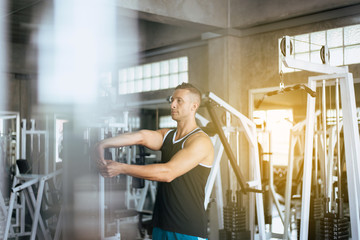 Sporty man stretching finger for warming up befor doing exercises training