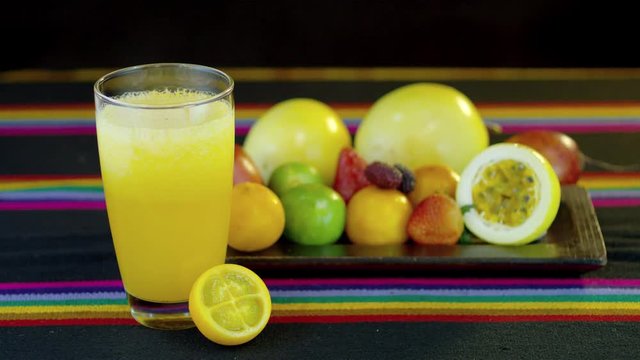 Fresh fruits and a glass of naranjilla or lulo juice