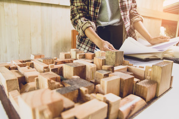 Concept architects, working and engineers or architects are reading, Analyze .on the interior design of the housing project on blueprint