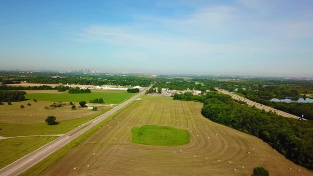 Forward view of a smaller mound with the city of ST. Louis in the Background