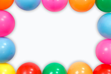 Colorful balls placed on white background.Free space for background