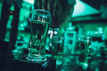 Green Beer Standing on Bar Counter at Pub