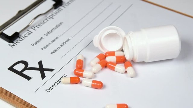 Prescription pills and prescription paper. Health Care Concepts.