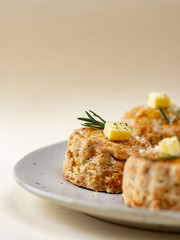 Homemade Cheese Scones with butter.