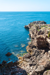 Rock leaving the ocean in Portugal