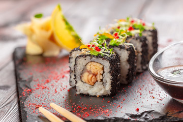 fresh sushi on rustic wooden table