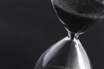 Hourglass on dark background