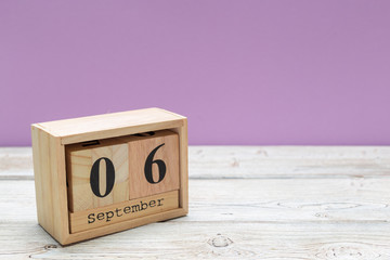 September 6. Image of September 6 wooden calendar on wooden background . Autumn day