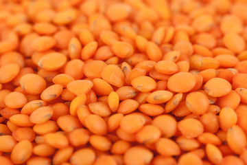 red lentils forming a background pattern, healthy food