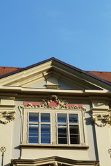 Pediment of a building typical of Prague, Czech Republic