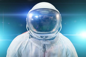 Cosmonaut or astronaut or spaceman suit and helmet with blue light effects