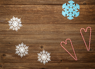 Christmas composition on wooden background.