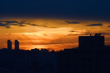 Sunset silhouette of skylines
