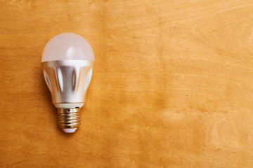  light bulbs on a wood background