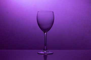 Wine glass in the club light night on weekends and holidays