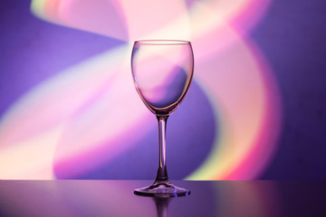 Wine glass in the club light night on weekends and holidays
