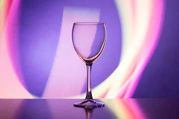 Wine glass in the club light night on weekends and holidays