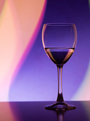 Wine glass in the club light night on weekends and holidays