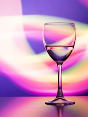 Wine glass in the club light night on weekends and holidays