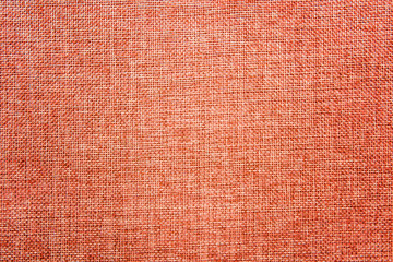 Orange and beige multicolored burlap background