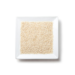 white sesame on a plate isolated
