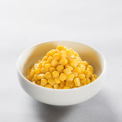 A small bowl of corn