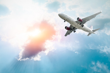 Airplane flying in the blue sky