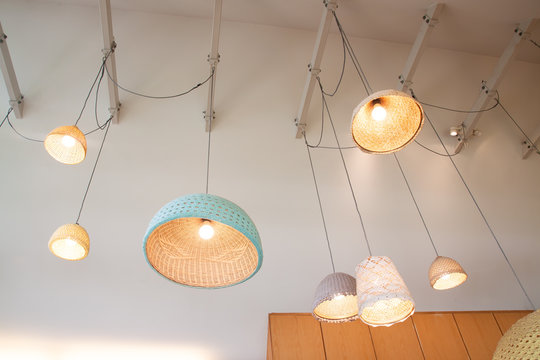 Hanging lamps made from bamboo and handmade crochet design decorated in cafe or restaurant