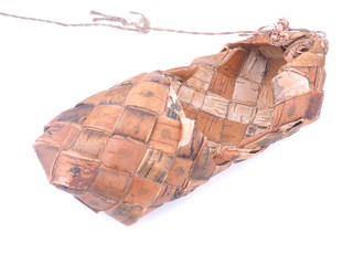 bark bast shoes on white background