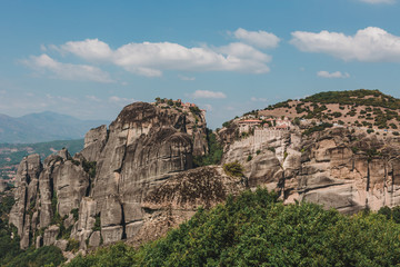 Mountain scenery with Meteora rocks and Roussanou Monastery, landscape place of monasteries on the rock.