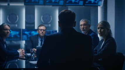 Chief Strategy Officer Making Report to a Board of Directors During Annual Financial Meeting in the conference Room. Business People / Politicians / Government Officials on a Meeting. - obrazy, fototapety, plakaty