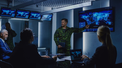 High-Ranking Military Man holds a Briefing to a Team of Government Agents and Politicians, Shows...