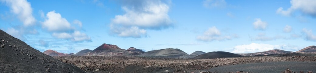 Volcano caldera and lava field. Lanzarote, Canary Islands. Panorama