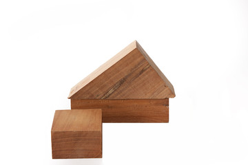 wooden house made of wood block on white background,business