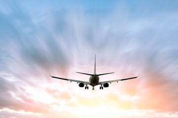 Airplane flying in the blue sky