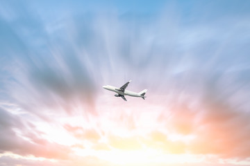 Fototapeta na wymiar Airplane flying in the blue sky