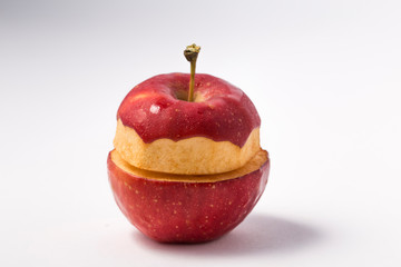 Small apple with green leaf on white background. ranetka